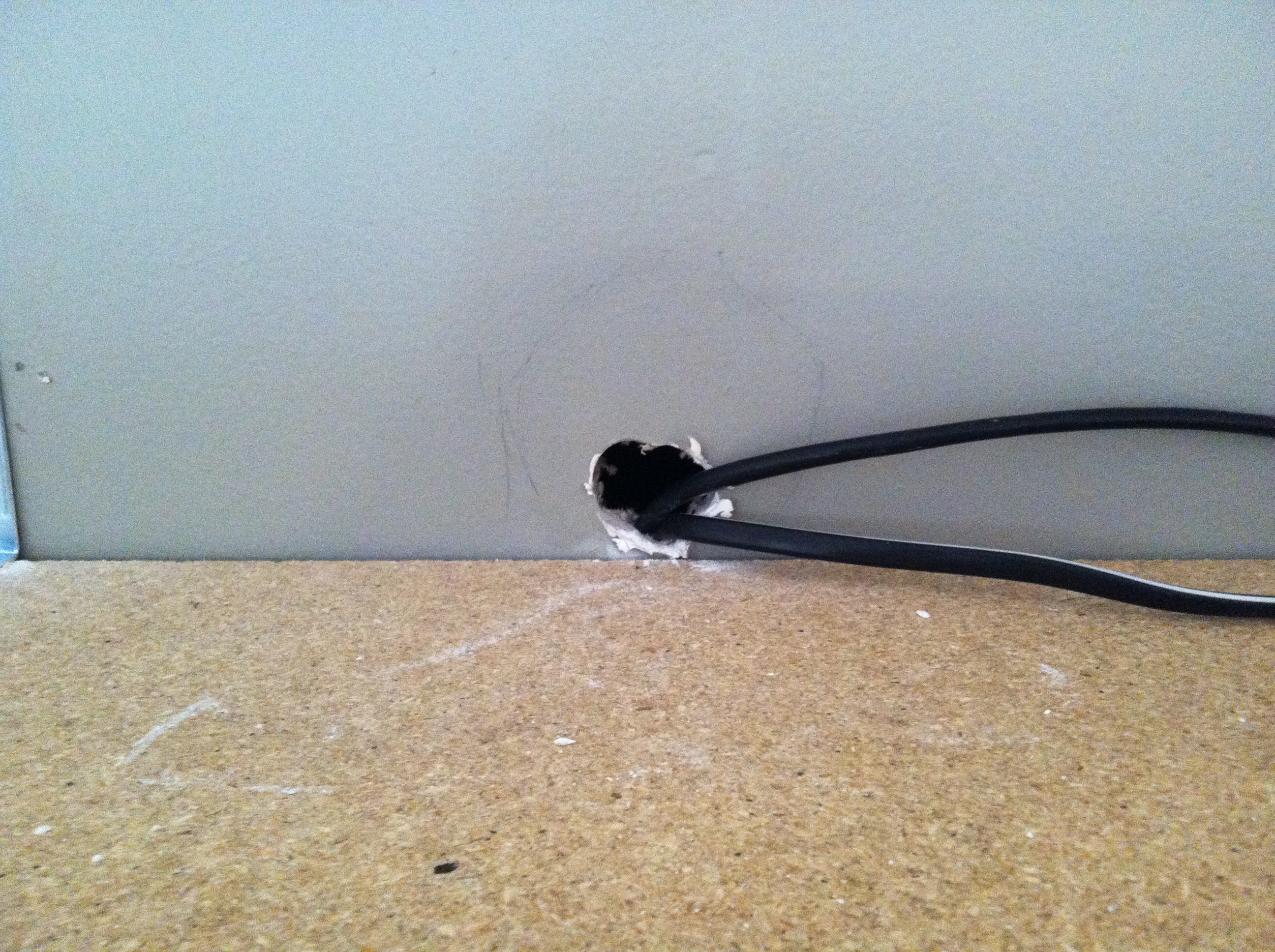 How to Run TV Cables Through a Wall (so they're hidden) - Chris